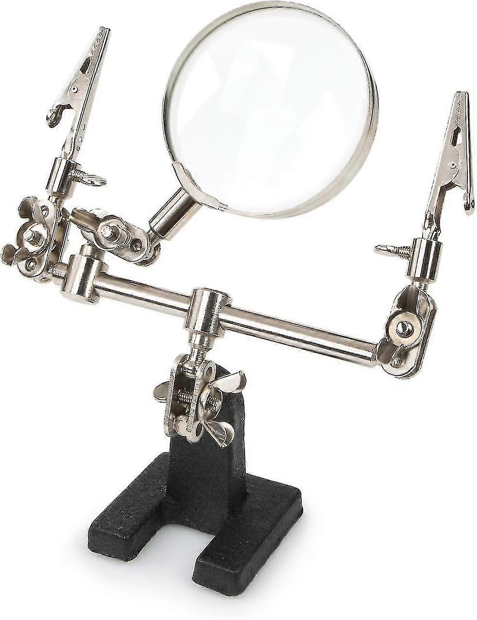 Troisième main avec loupe