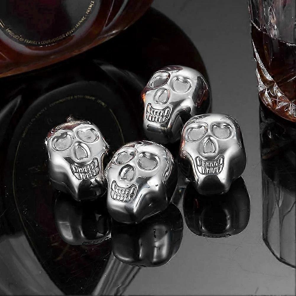 Alloy cooling cubes featuring macabre engravings, sustaining undiluted beverage freshness