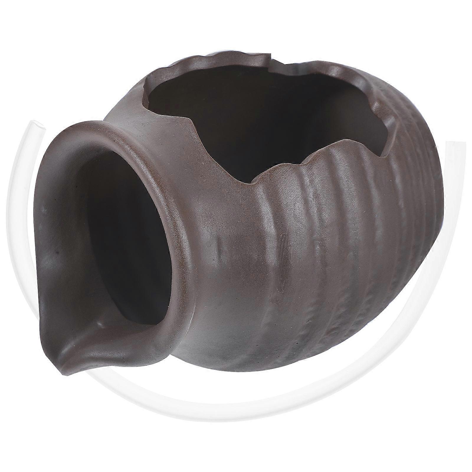 The **Ceramic Fountain Jar Circulating Waterfall Vase** is a decorative and functional piece designed for use in **hydroponic gardens** or **outdoor