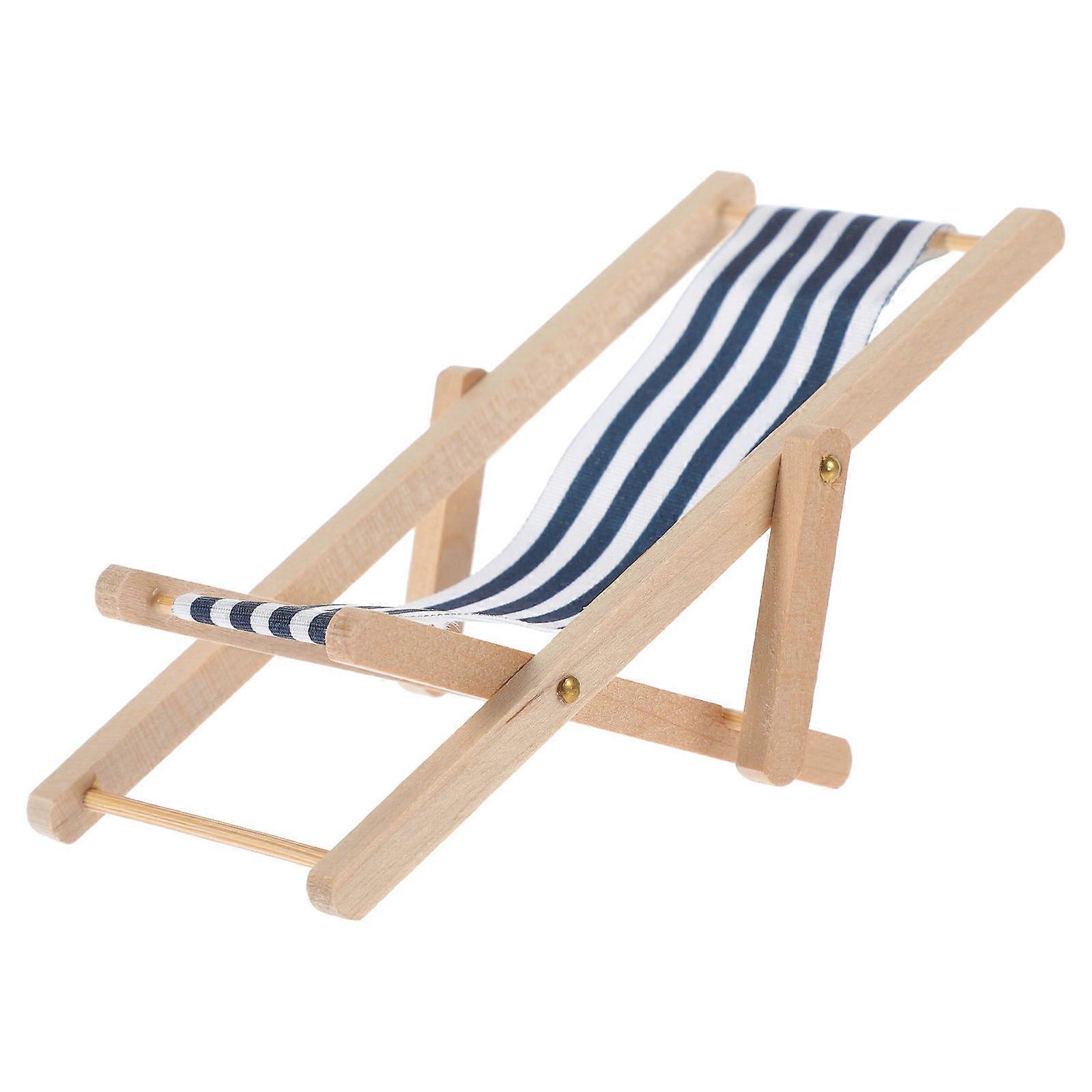 The **Scale Dollhouse Lounge Chair** is a charming and portable folding furniture piece designed specifically for dollhouse scenes, seaside themed