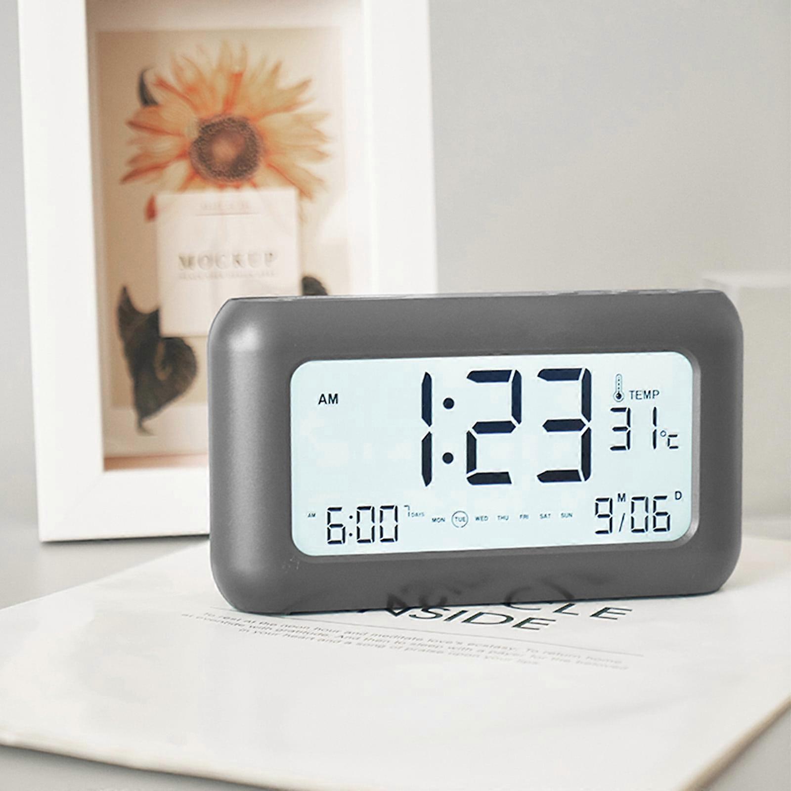 Jacenvly Black Tech 170° LCD Clock: Date, Temp, 3 Alarms, Night Light, Rechargeable – Room Decor. Compatible with AAA batteries.
