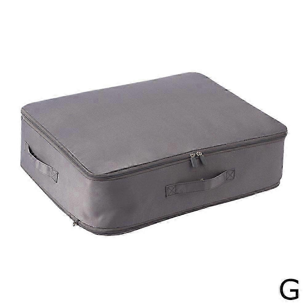 Space-saving self-compression organizer, compression blanket storage bag