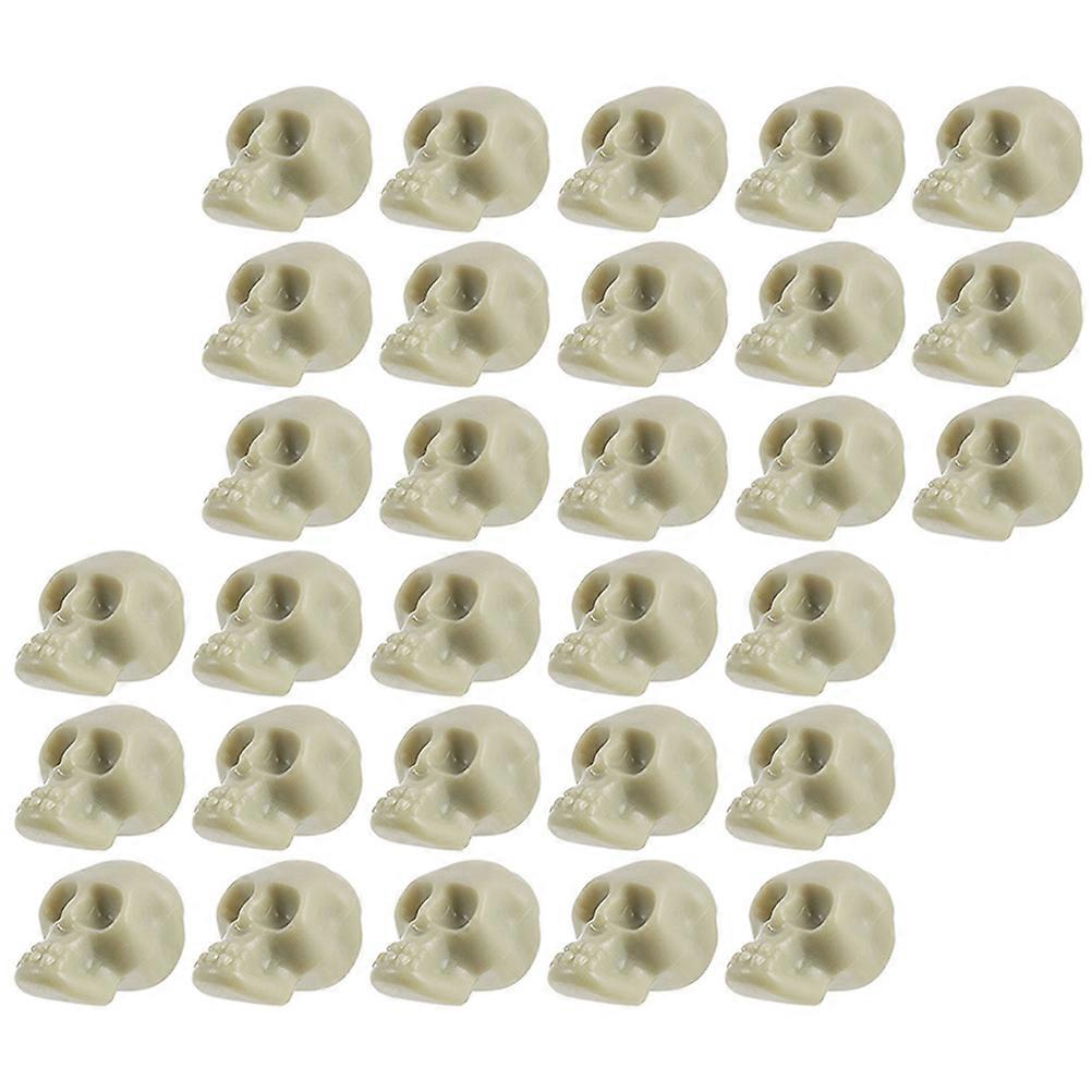 Here's a polished product description for your **50pcs Miniature Skull Halloween Party Props**:
🎃 **50pcs Miniature Skull Halloween Party Props