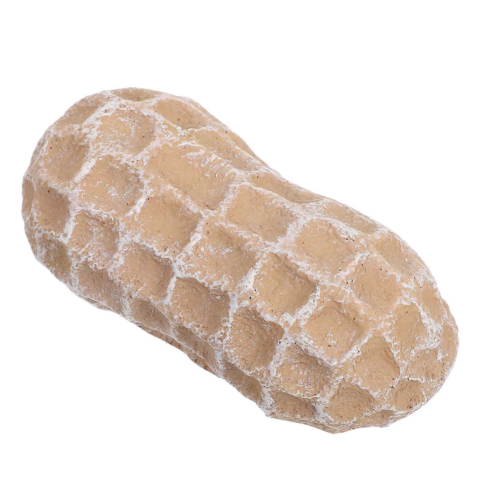 The **Outdoor Key Holder Realistic Peanut Shape Key Hider Box** is a clever and discreet solution for securely storing spare keys around your home,