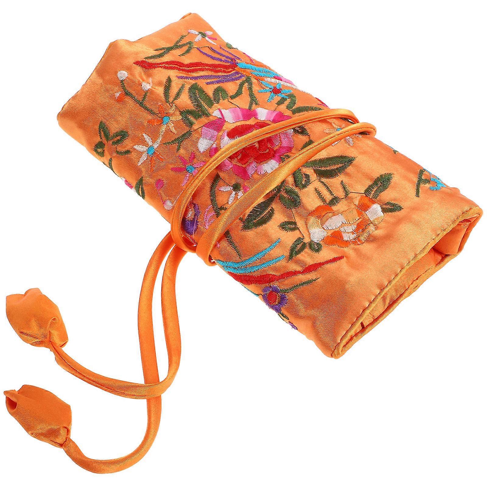 Portable Brocade Pouch with Roll Design for Storing Accessories on the Go