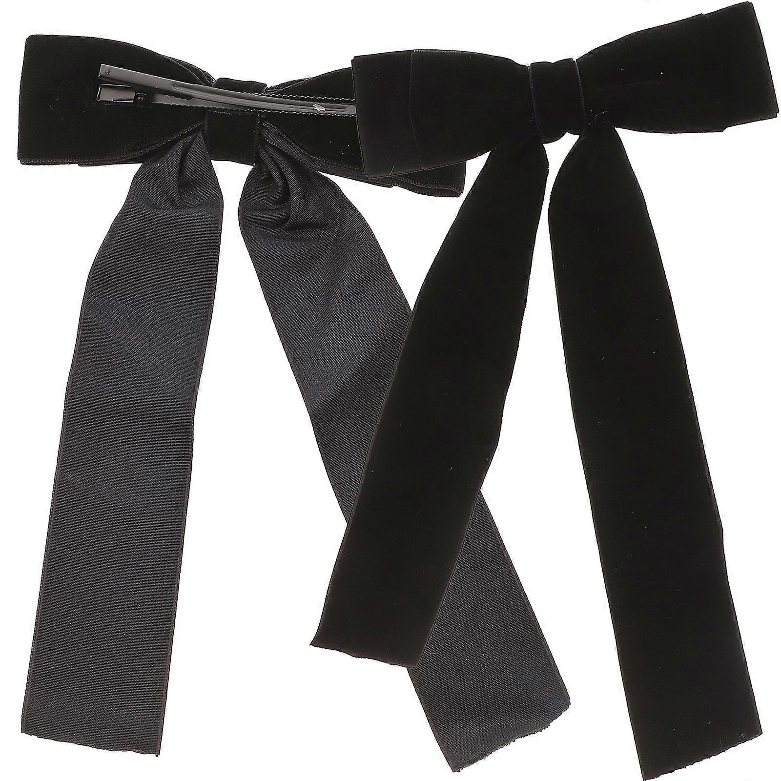 a refined and professional product description based on your input:
**2PCS Bowknot Hair Clips – Chic Solid Color Hairpins for Women**
Add a