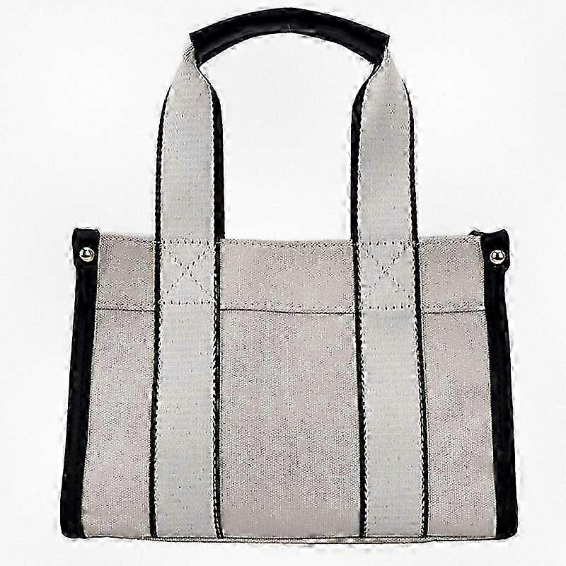 Spacious Structured Canvas Tote Bag with Handles Suitable for Everyday Use