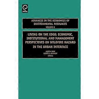 Living on the Edge Economic Institutional and Management Perspectives on Wildfire Hazard in the Urban Interface