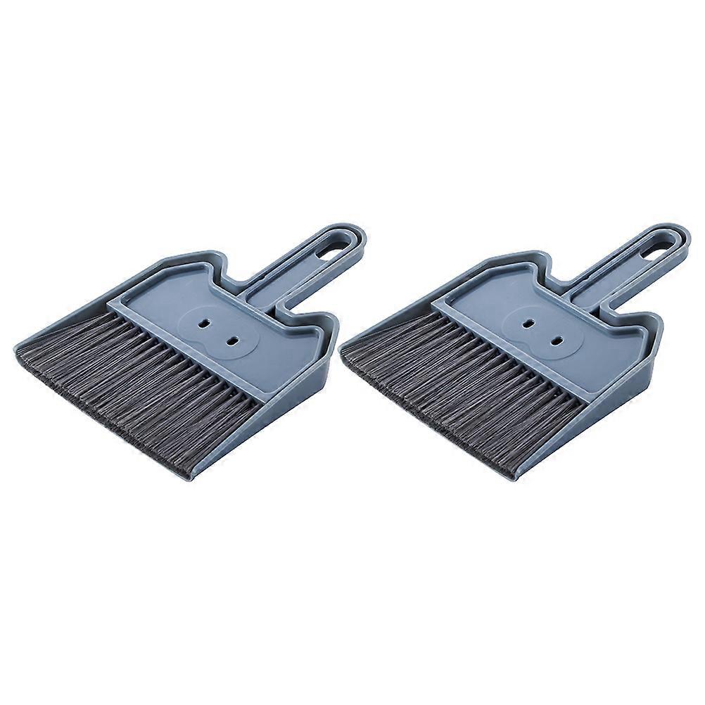 It seems you're referring to a **mini broom and dustpan cleaning tool set**, likely used for small scale cleaning tasks around the home, such as: