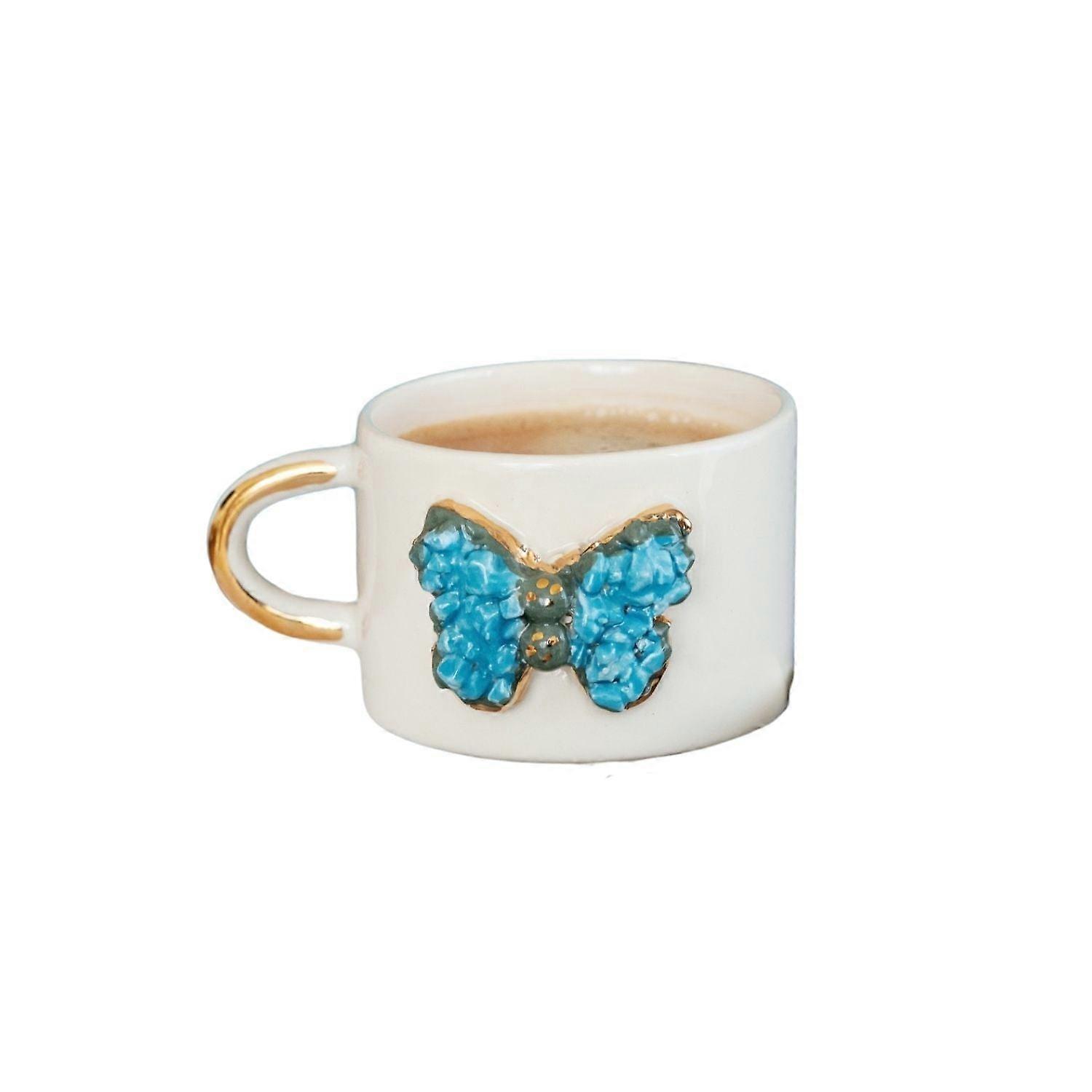 Mug artisanal en céramique avec papillon bleu 3D et anse plaquée or – 200 ml