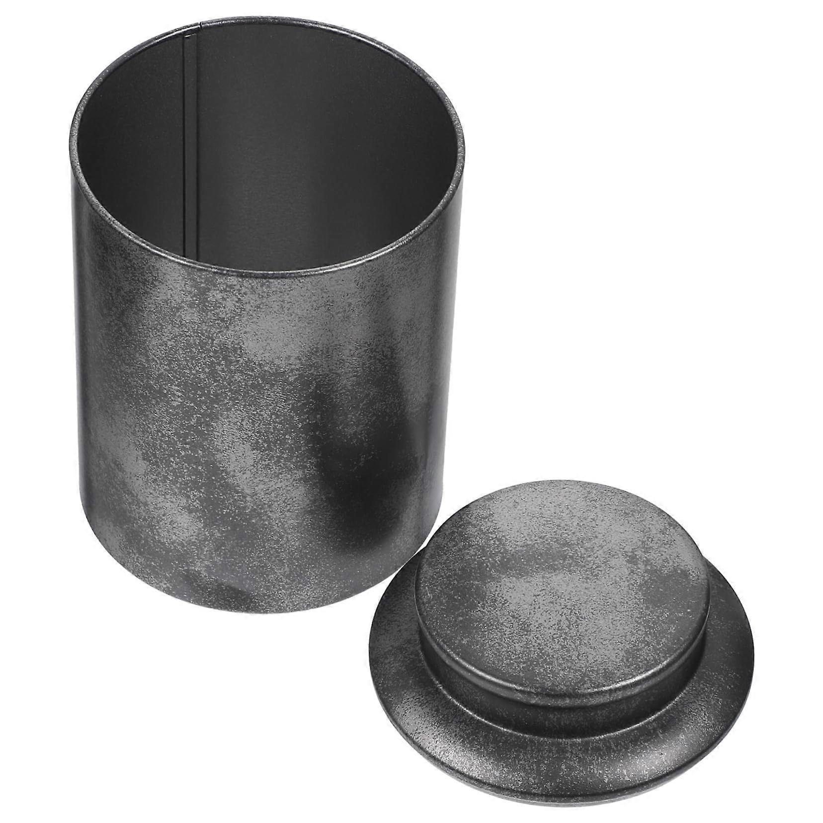 Small tin can for loose tea leaves, airtight tea tin made of tinplate for storing tea, sweets, and as table decoration.