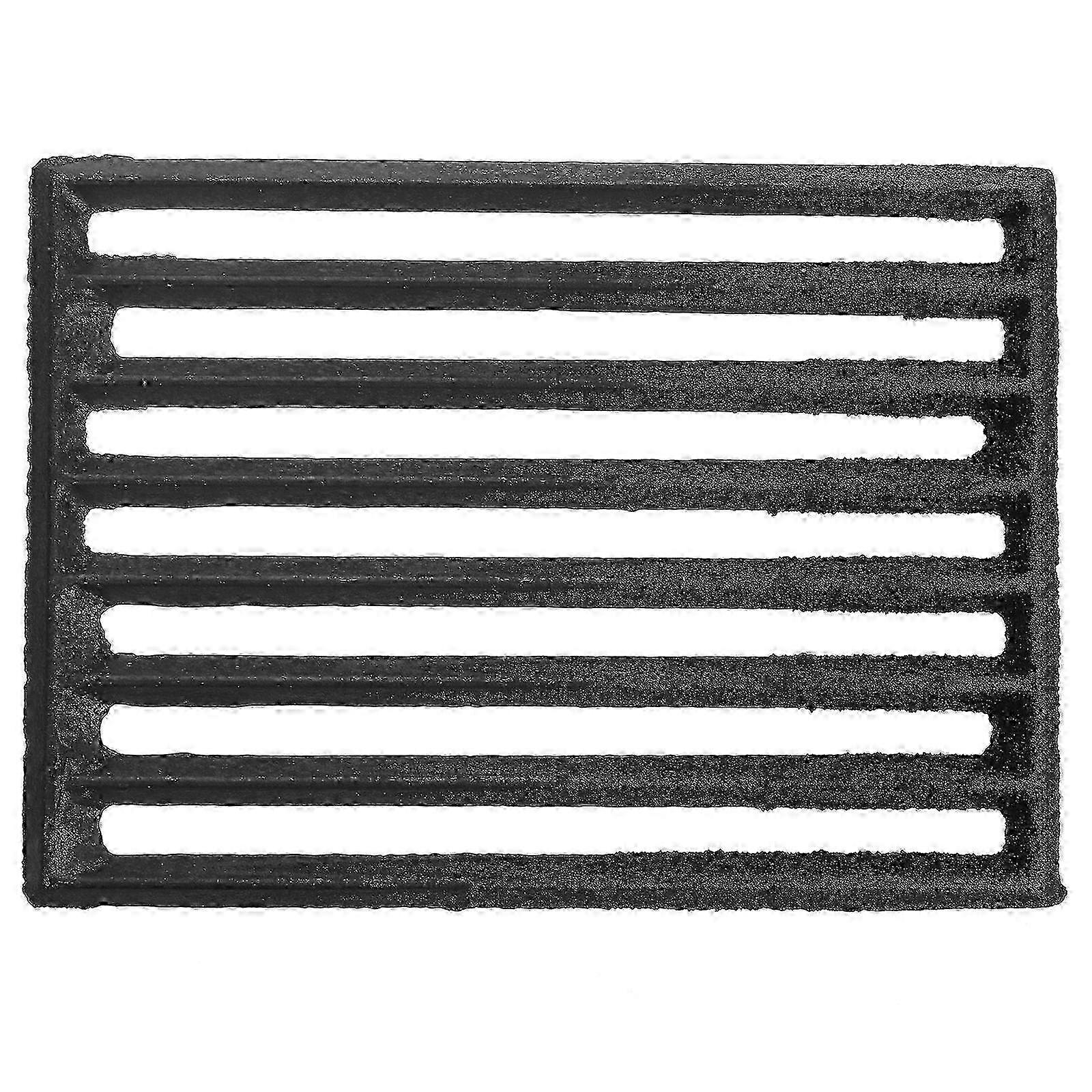 Une grille de cheminée en métal épais et robuste pour une cheminée et un poêle à bois, une grille de canal pour bois de chauffage