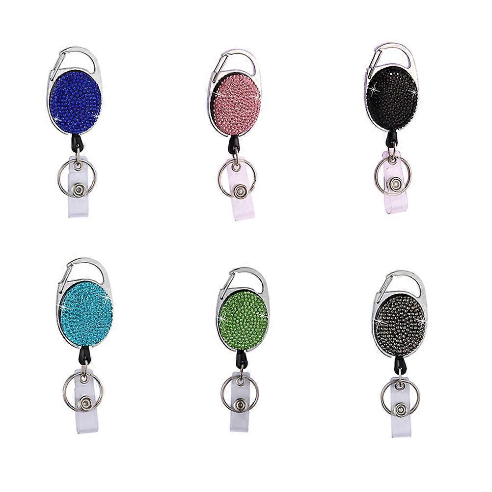 It sounds like you're describing a product listing or description for **retractable rhinestone badge clips with ABS straps**, which are used as **ID