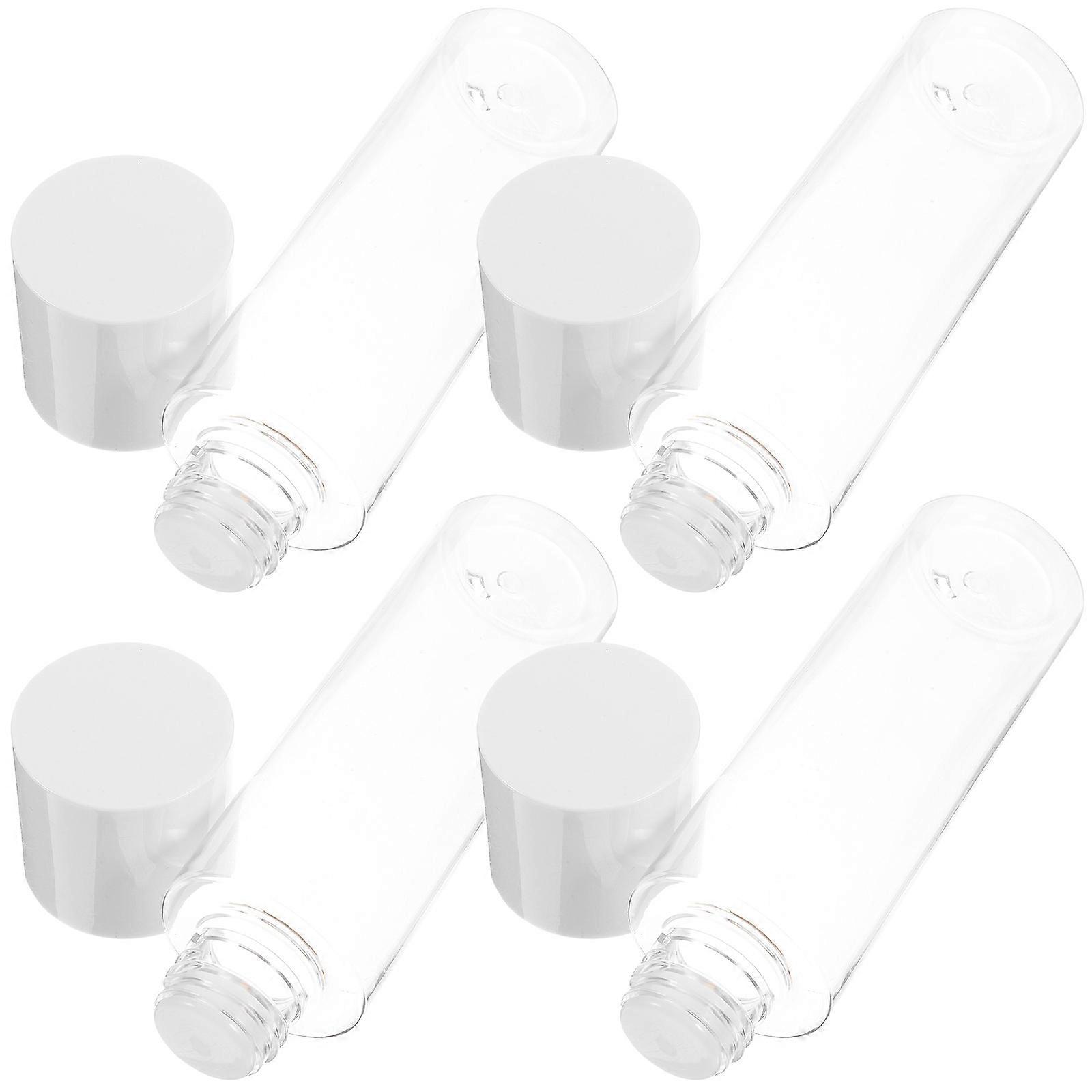 4Pcs Refillable Travel Bottles Designed For Daily Use Fashioned In A Transparent Cylindrical Shape With 120ml Capacity