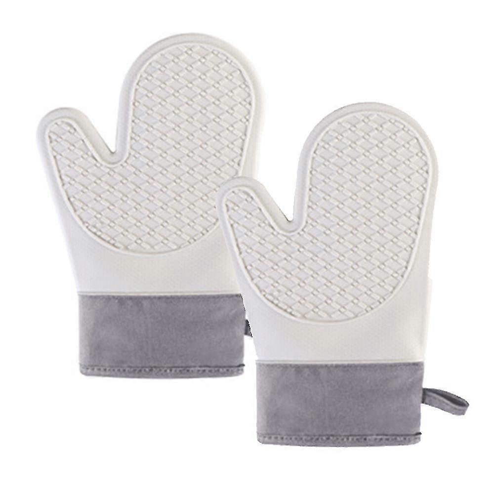 A pair of insulated baking and barbecue gloves Microwave oven gloves Silicone and cotton gloves
