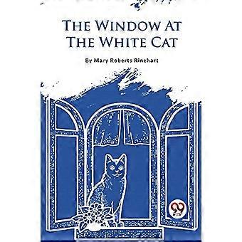 Het venster op de witte kat