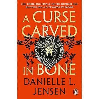 A Curse Carved In Bone - Danielle L. Jensen