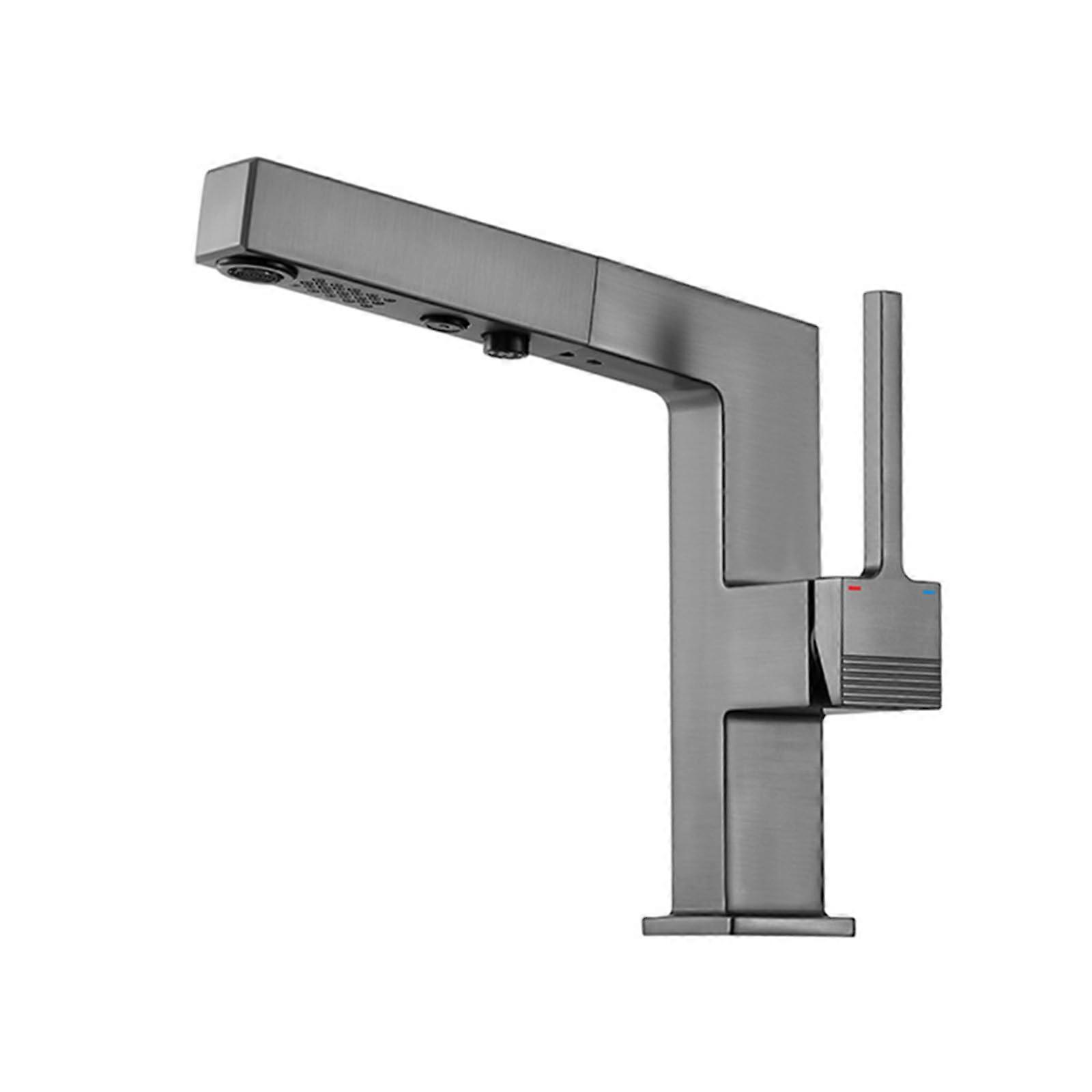 Modern brass faucet with pullout sprayer, singlehandle mixer for hot and cold water, basin shower mode, stylish white surface for easy cleaning.