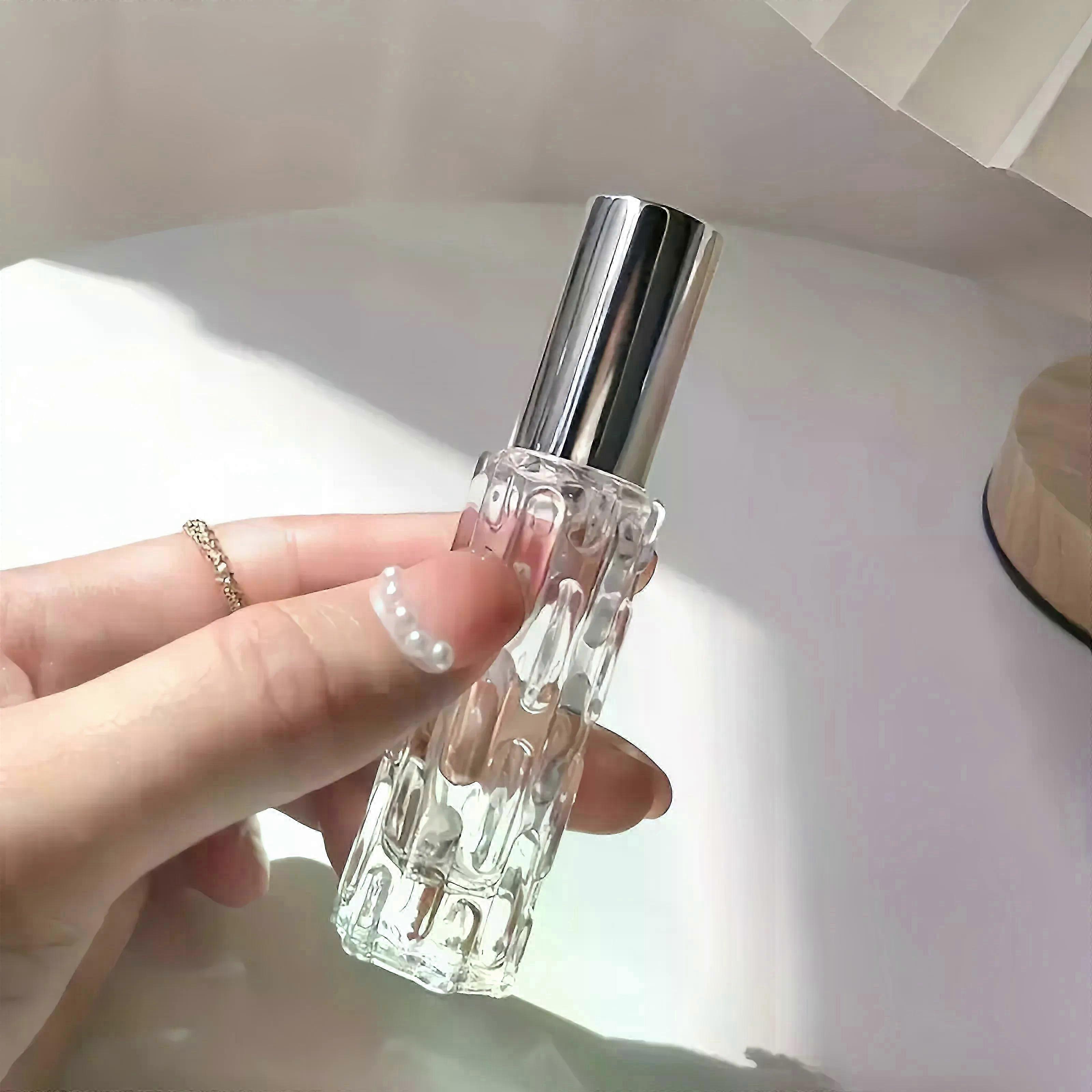 3 つのトラベル ミニ香水アトマイザー コンテナ セットには、3 つのスプレー ヘッド、2 つの漏斗、VA に適した 2 つのディスペンス ツールを備えた 10ml ボトルが含まれています