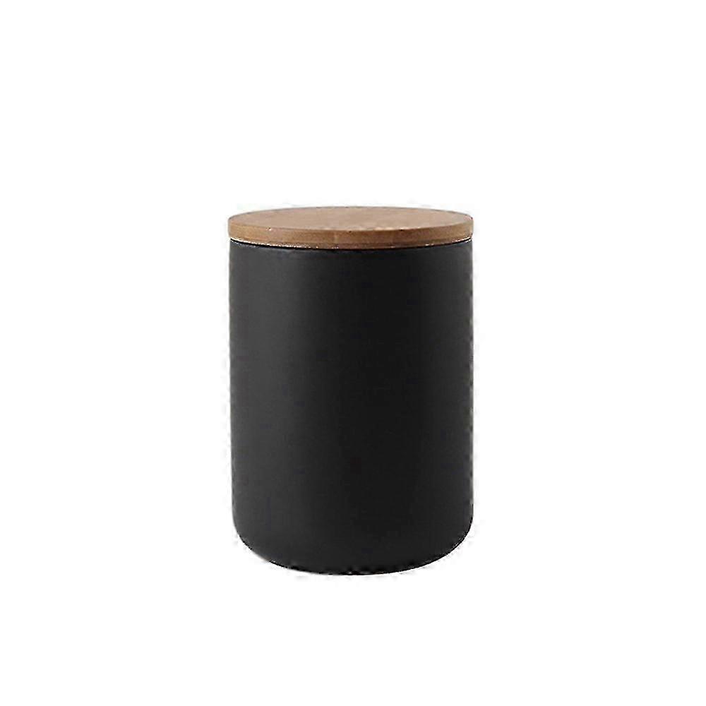 A set of Ceramic Kitchen Canisters and Storage Jars suitable for Tea, Sugar, Coffee, and Spice Organization.