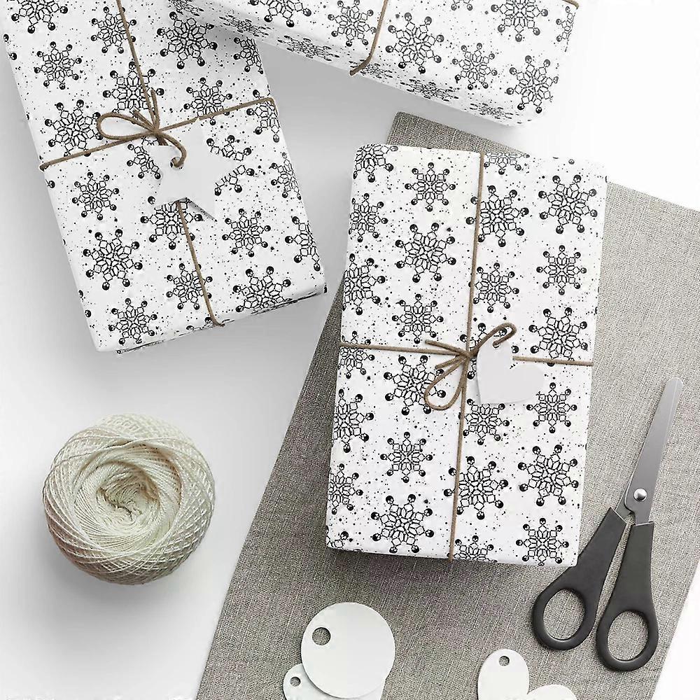 Black Snowflake Pattern Wrapping Paper | Winter Holiday Wrap