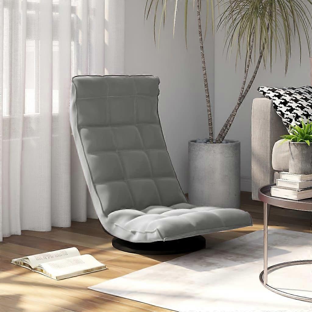 Chaise de sol pivotante en velours gris clair