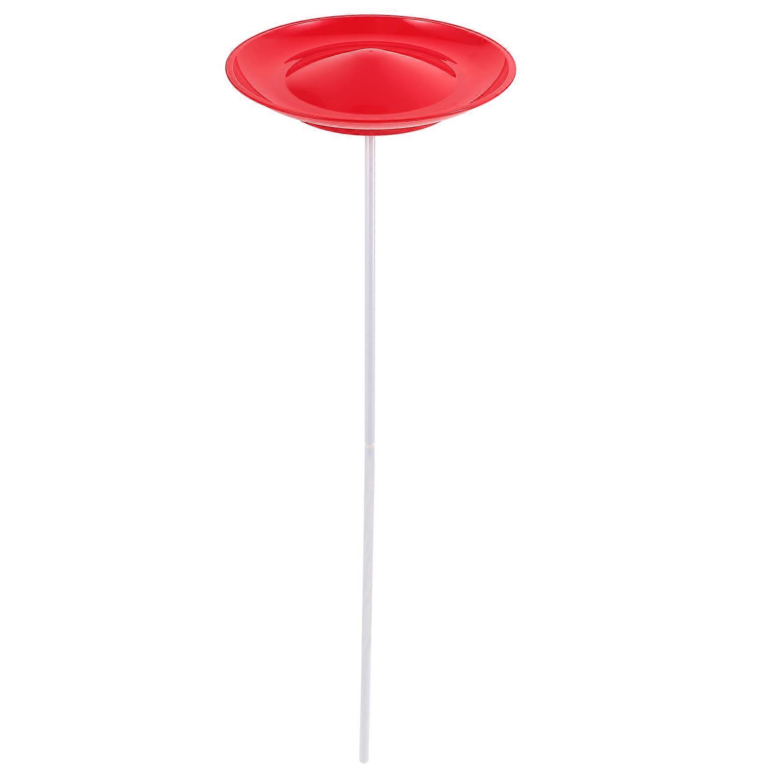 Circus spinning plate juggling with a stick is an engaging and visually appealing performance skill that combines coordination, balance, and rhythm.