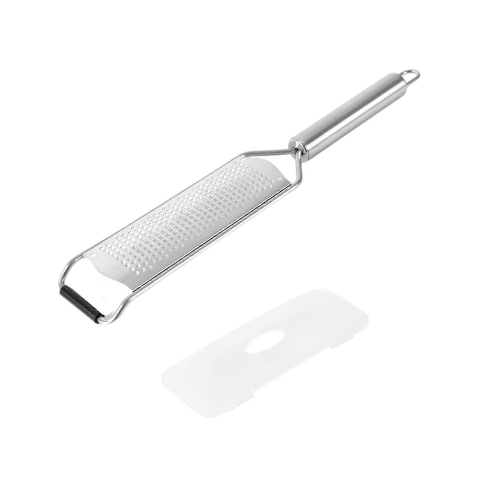 Multipurpose stainless steel kitchen tool for home use, vegetable slicer, lemon zester for cooking enthusiasts.