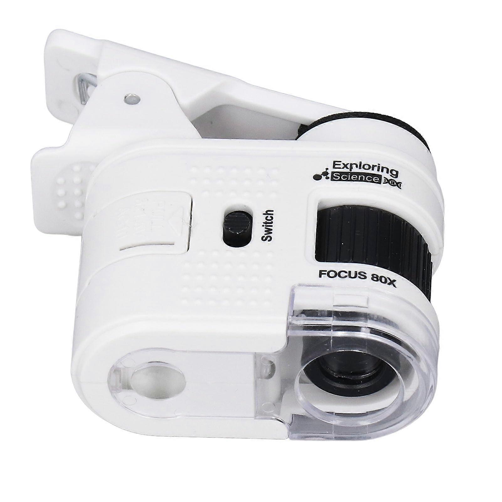 Compact pocket scope with magnification and phone clip, ideal handheld tool for outdoor exploration and inspection.