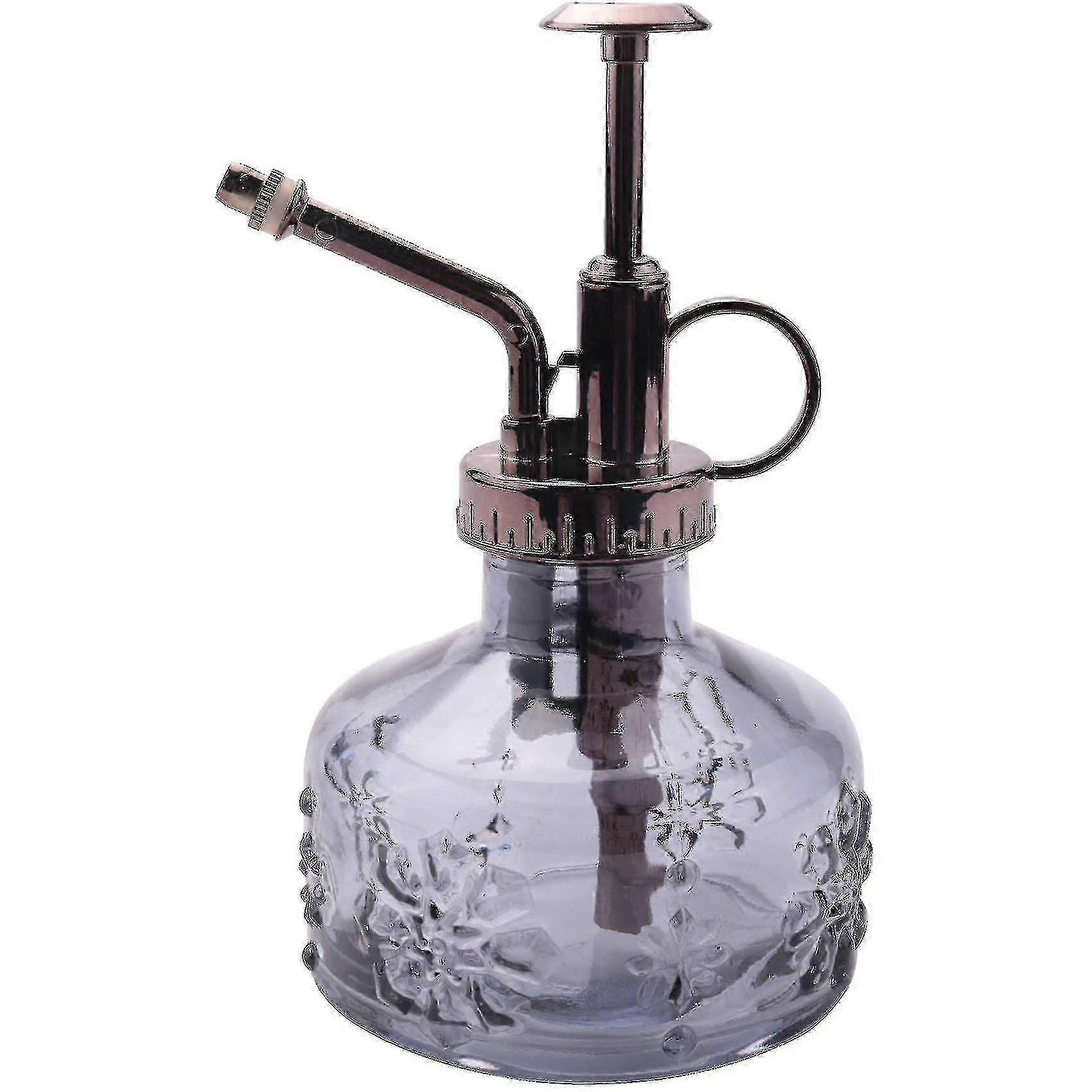 Lasinen suihkepullo kukkien kasteluun puutarhatarvikkeet harmaa