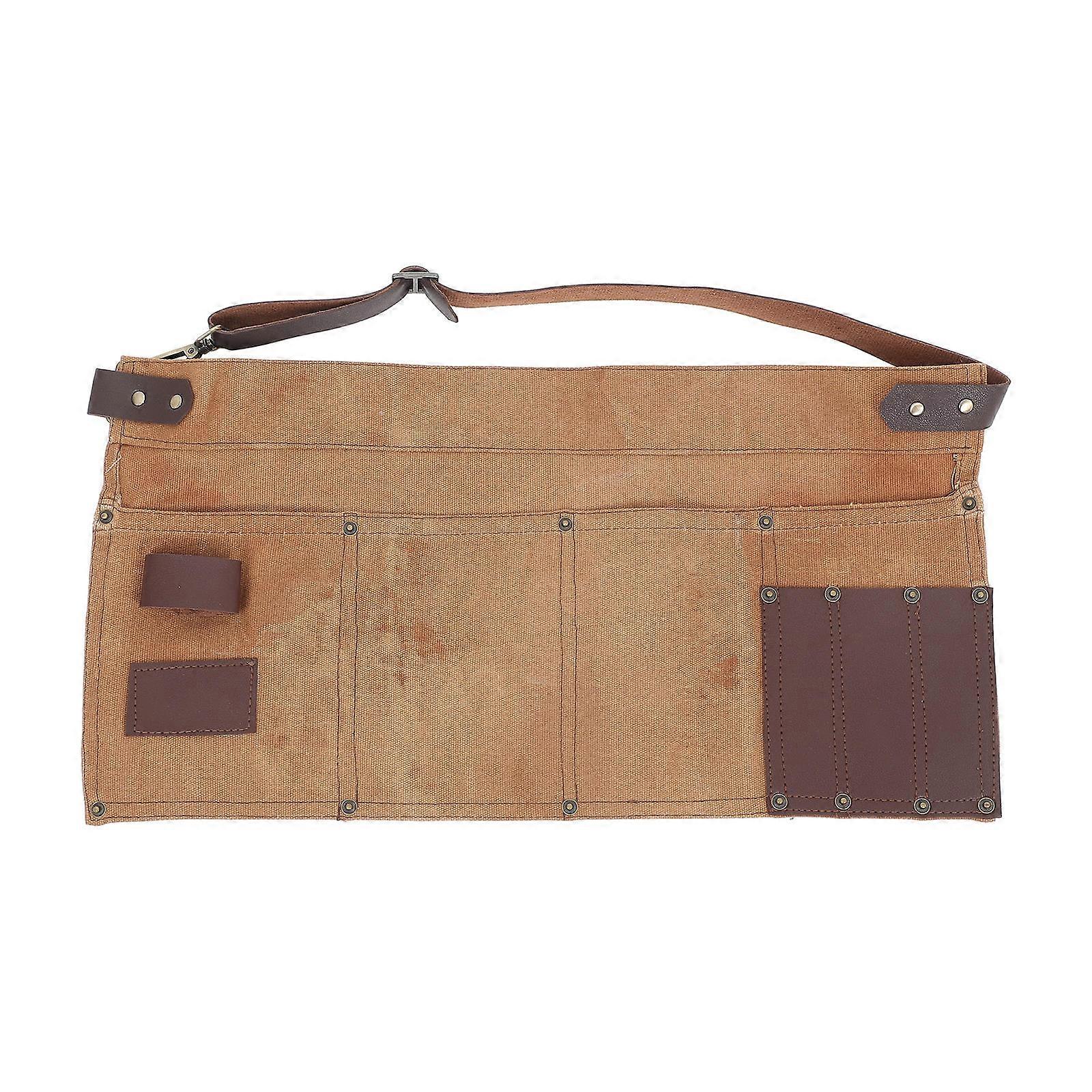 It sounds like you're describing a **gardening tool waist apron** or **canvas tool belt** designed for **gardeners, carpenters**, and other DIY