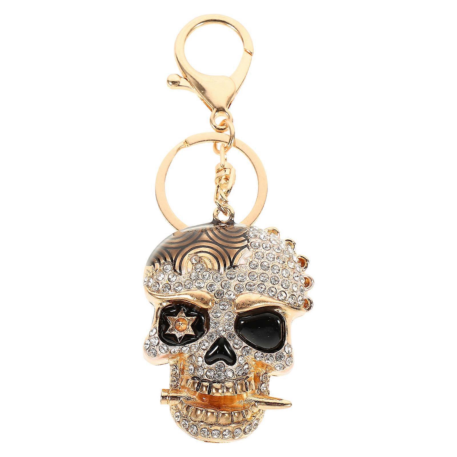Here's a polished and elegant product description for your **Elegant Skull Diamond Keychain Ornament Rhinestone Pendant**:
**Elegant Skull
