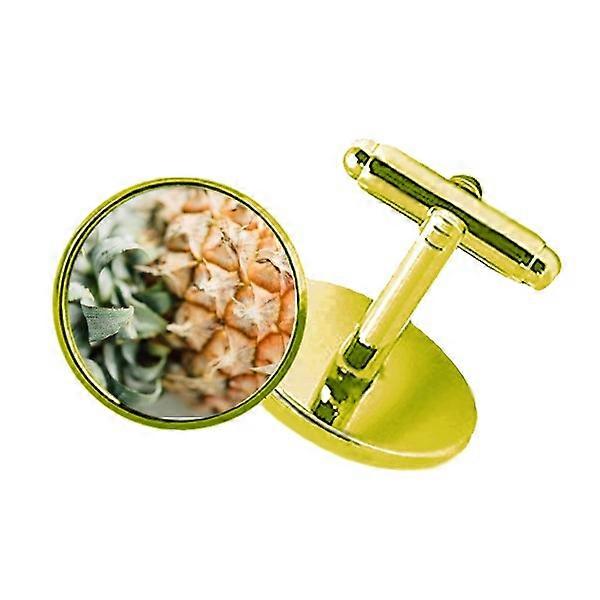 新鮮なトロピカルフルーツパインフルーツの写真スタッズビジネスメタルカフス金色