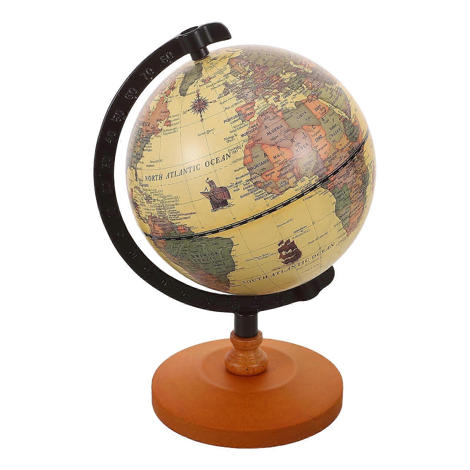 a refined product description for your **Vintage Rotating Earth Globe**:
### **Vintage Rotating Earth Globe – Sturdy Base – Home Office Aesthetic