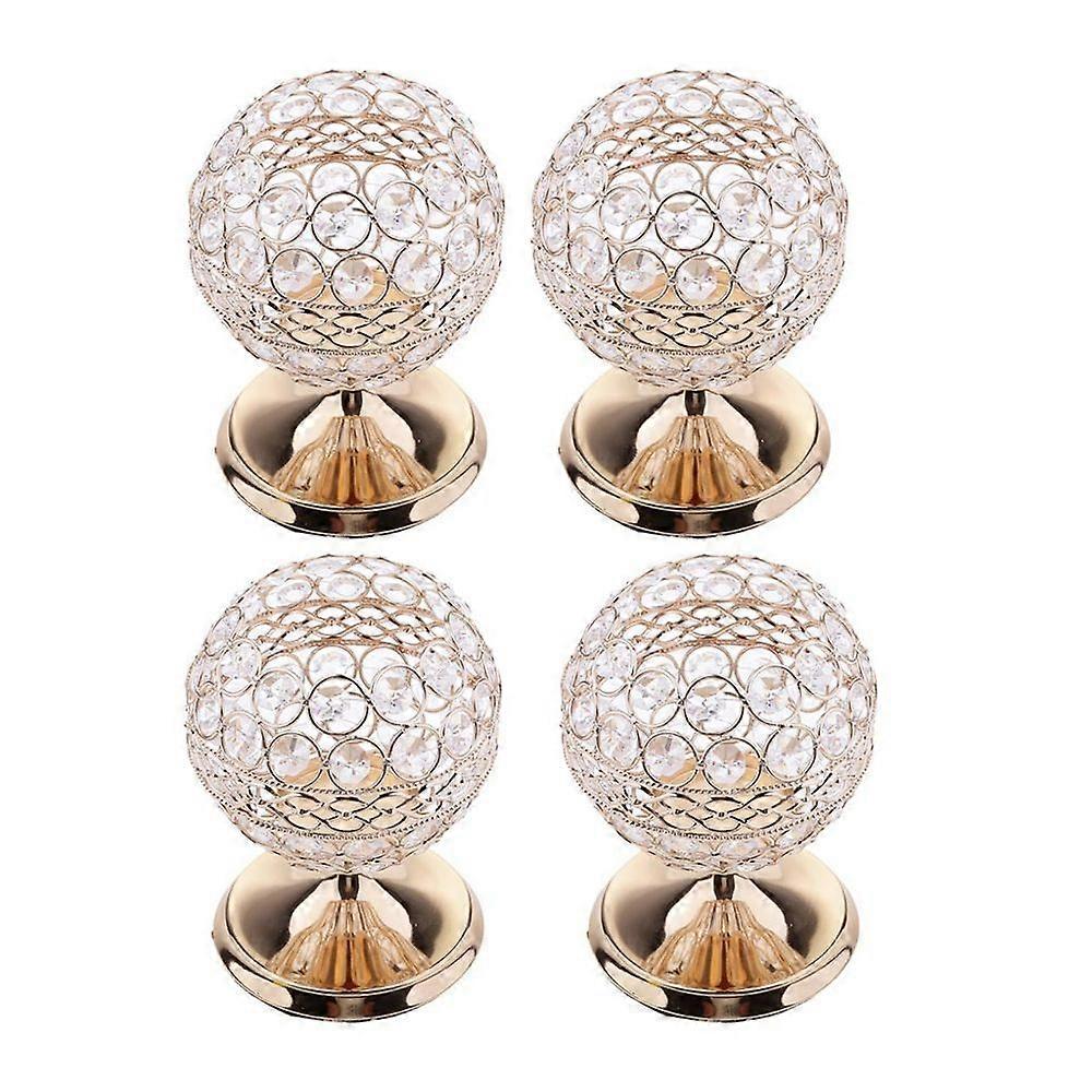 4 centres de table composés de bougeoirs en cristal