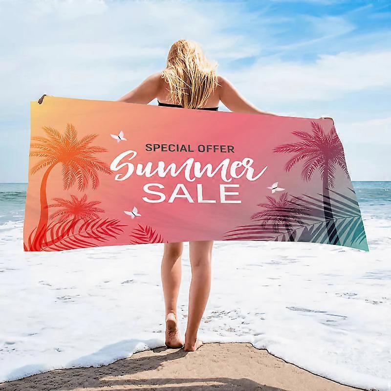 A quick-drying beach towel with palm leaf print and digital printing process.