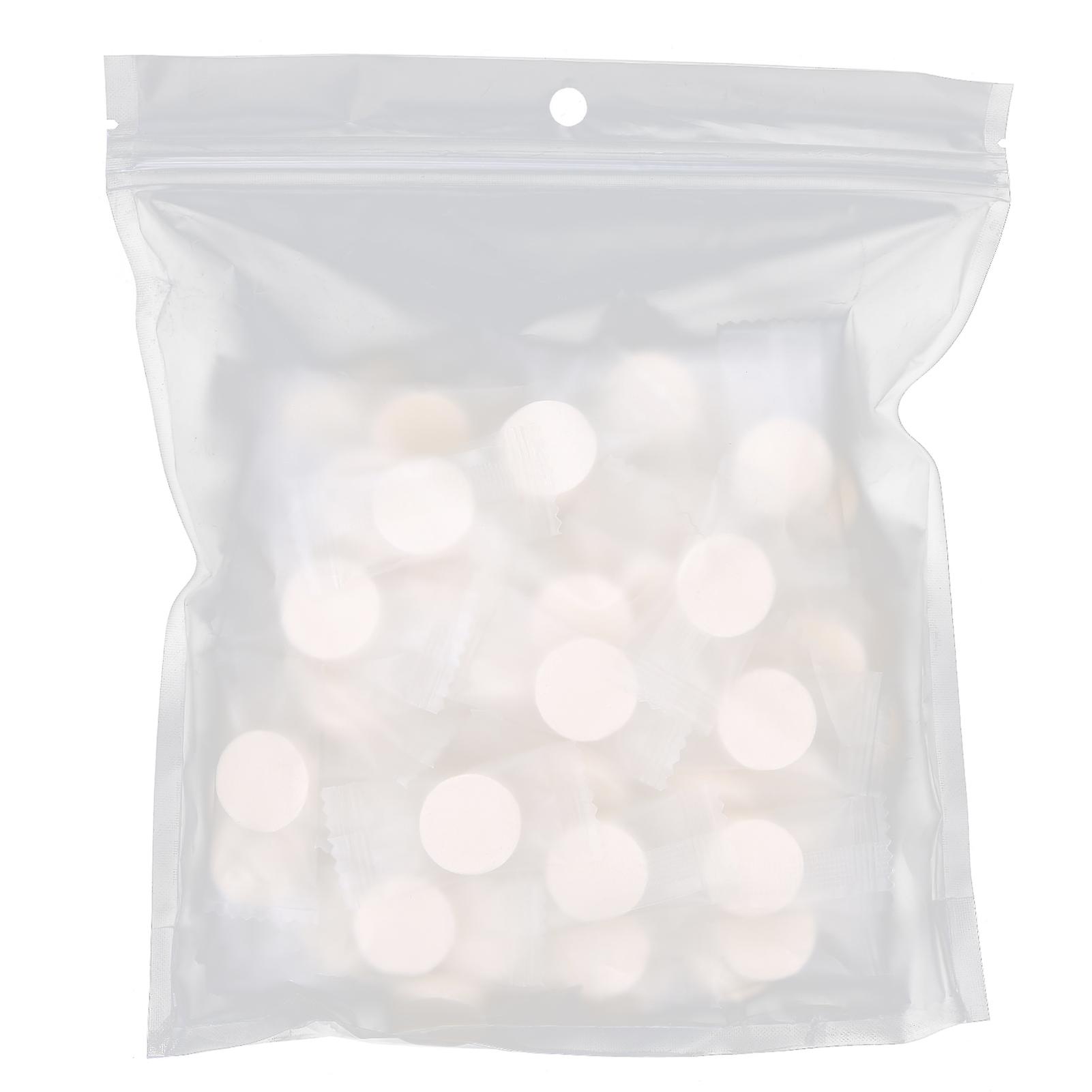 Lot de 100 masques faciaux jetables en soie compressée pour le soin de la peau