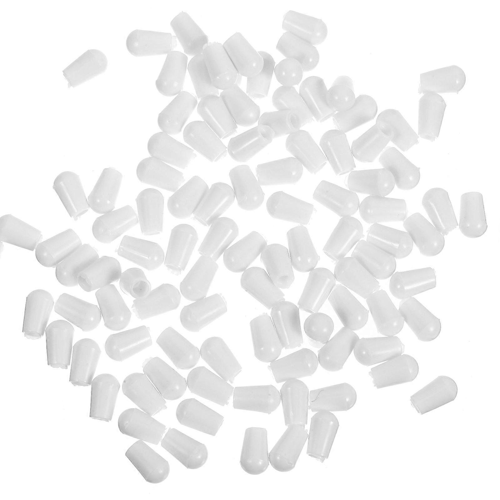 It looks like you're referring to a product listing for **white PVC hanger end caps or prong covers**, likely used for safety and protection on wire