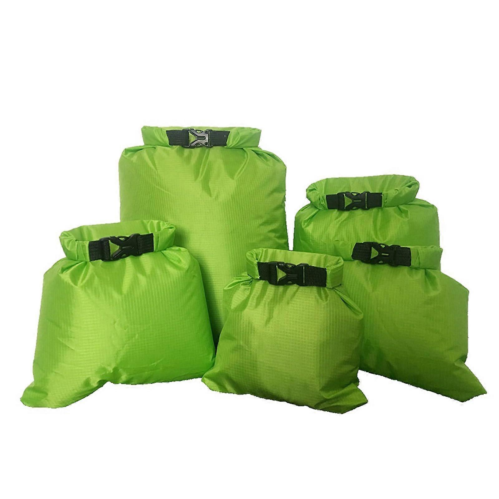 5 lightweight dry bags with roll closures keep equipment dry for hiking, beach, fishing, camping, rafting, boats, green.