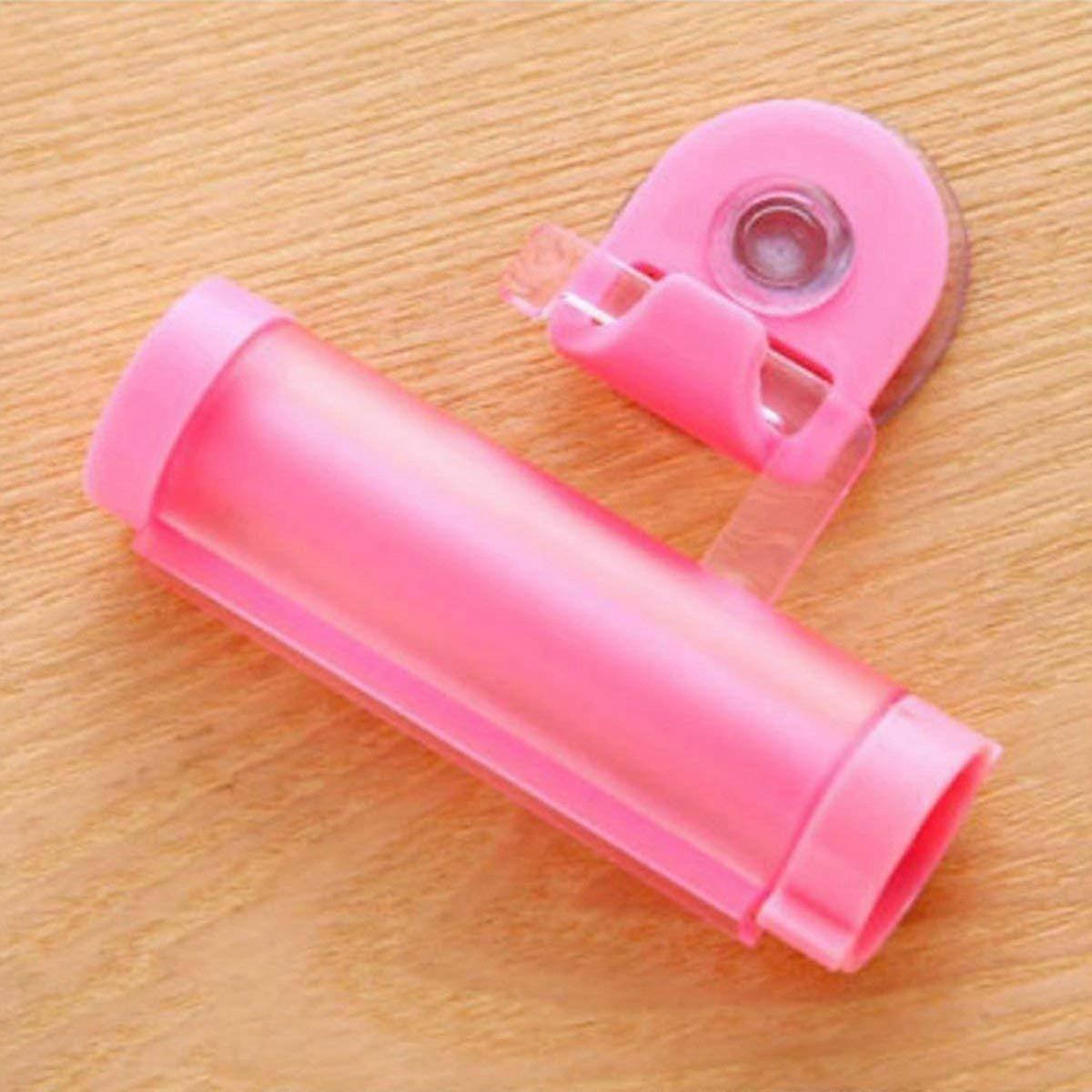 Easy Squeezer Toothpaste Roller Tube Rack Dispenser Rolling Holder Easy Squeeze Paste Dispenser Roll Holder Hanging Pink