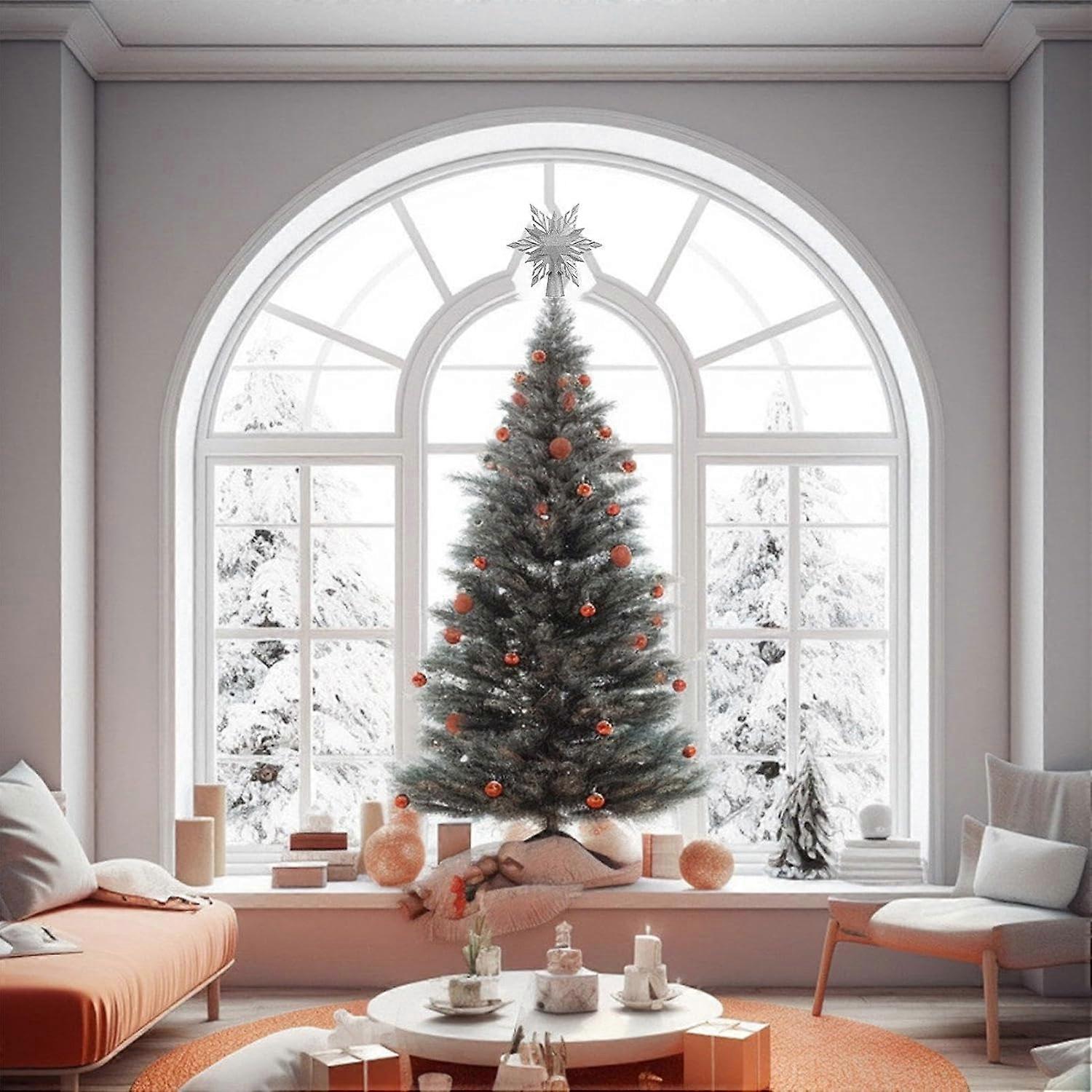 Snowflake tree topper with effective decorative lights. Projected deco