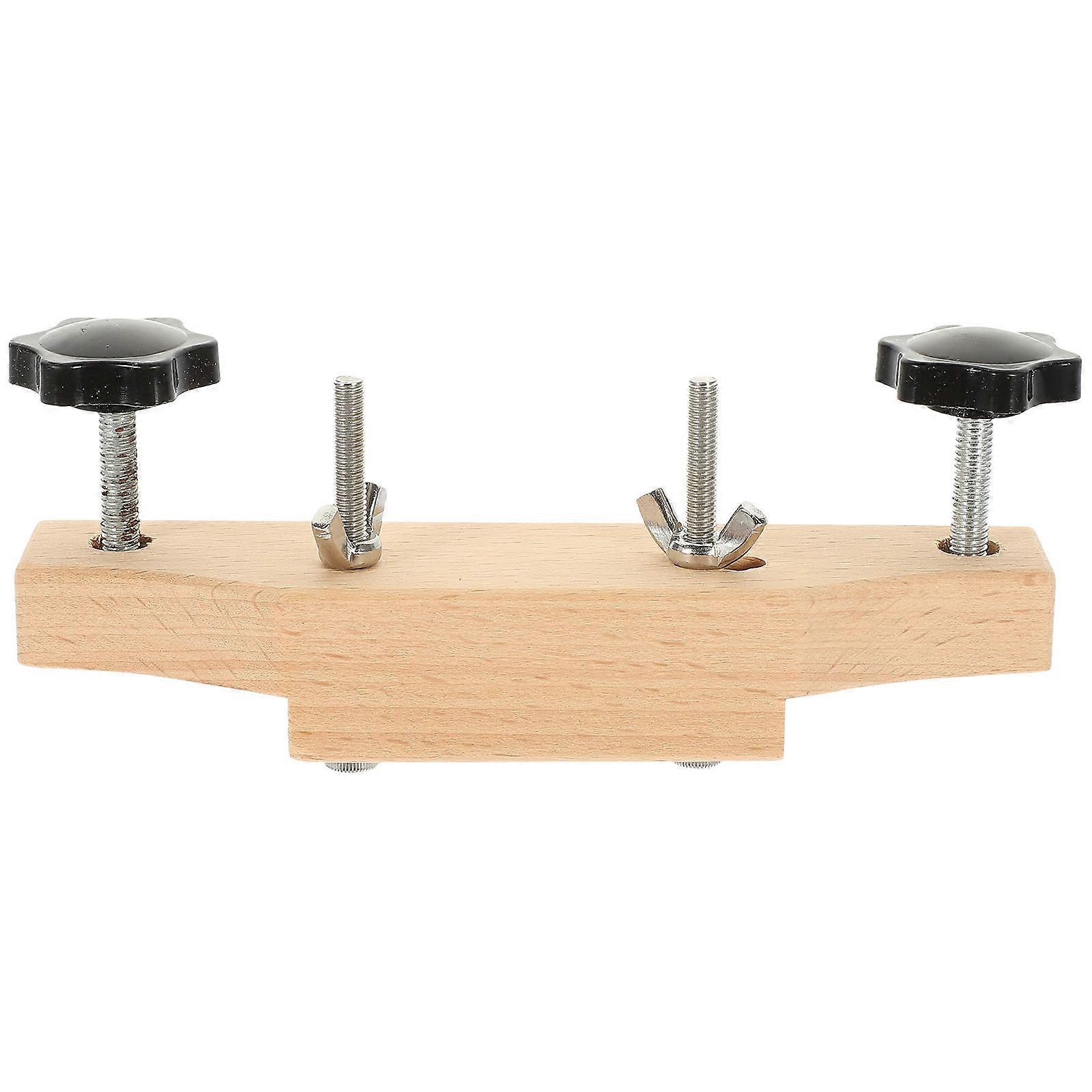 The **Solid Wood Acoustic Guitar Bridge Clamp Tool** is an essential maintenance accessory designed specifically for entry level acoustic guitars.