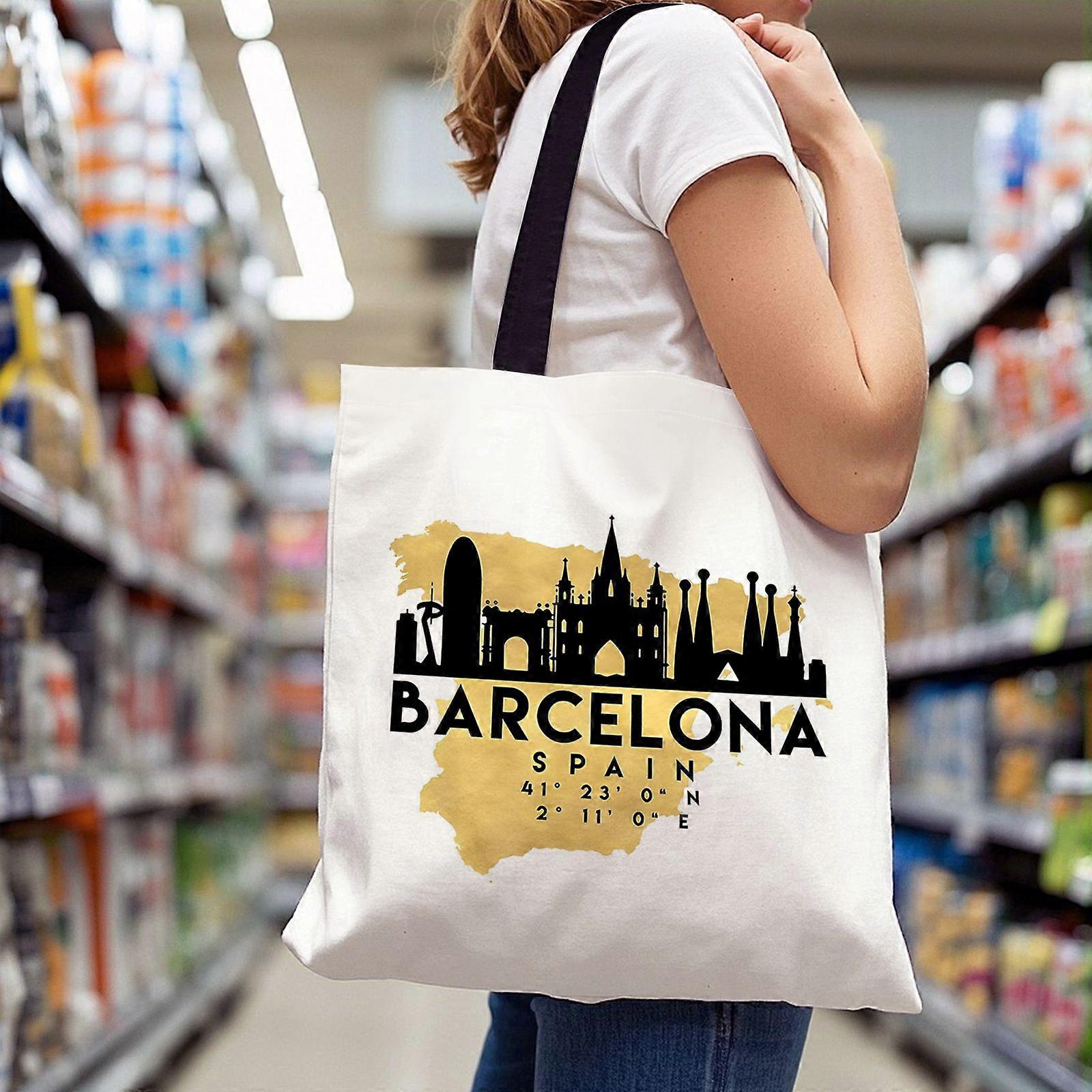 Sac fourre-tout grande capacité (1 pièce) avec motif de la skyline de Barcelone, fond jaune, contour de l'Espagne, léger, double poignée et fermeture à rabat.