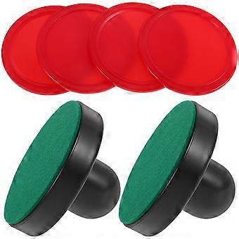 Conjunto de rebatedores e discos de air hockey, incluindo slalos, alças e acessórios de reposição para mesas de jogo.