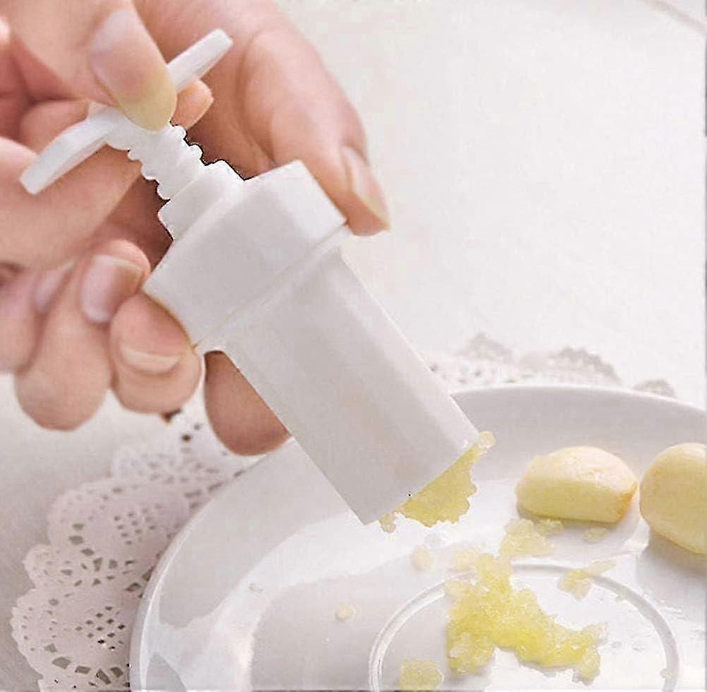 Twist-Action Garlic Puree Maker