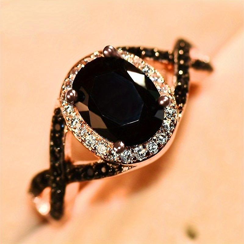 Smuk sort Zircon oval sten X ring - perfekt til bryllupper og forlovelser!