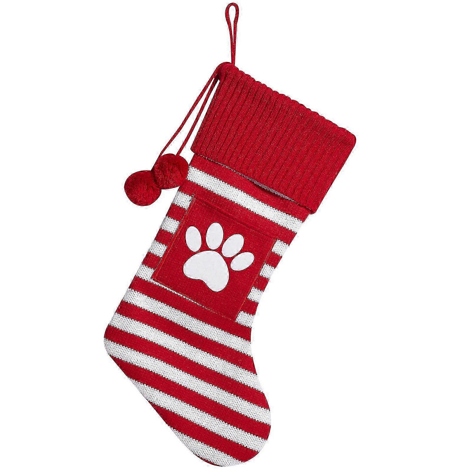 Striped Christmas stockings and tree decorations with large letters