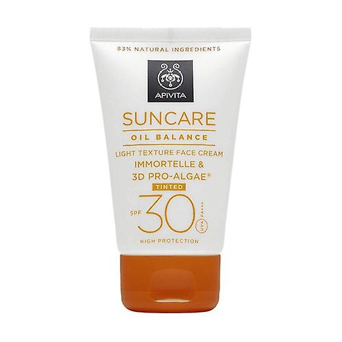Sunscreen regulator excess fat with color SPF30 50 ml of cream