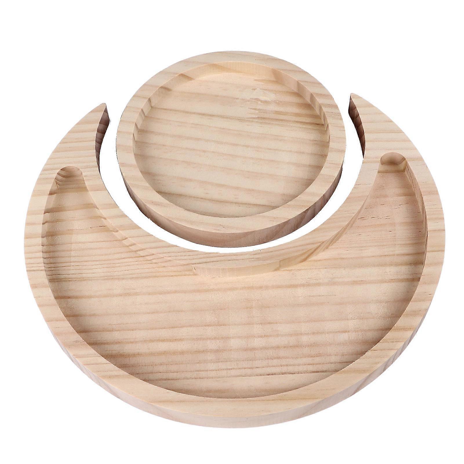 Round wooden tray with moon pattern and crystals, ideal for home