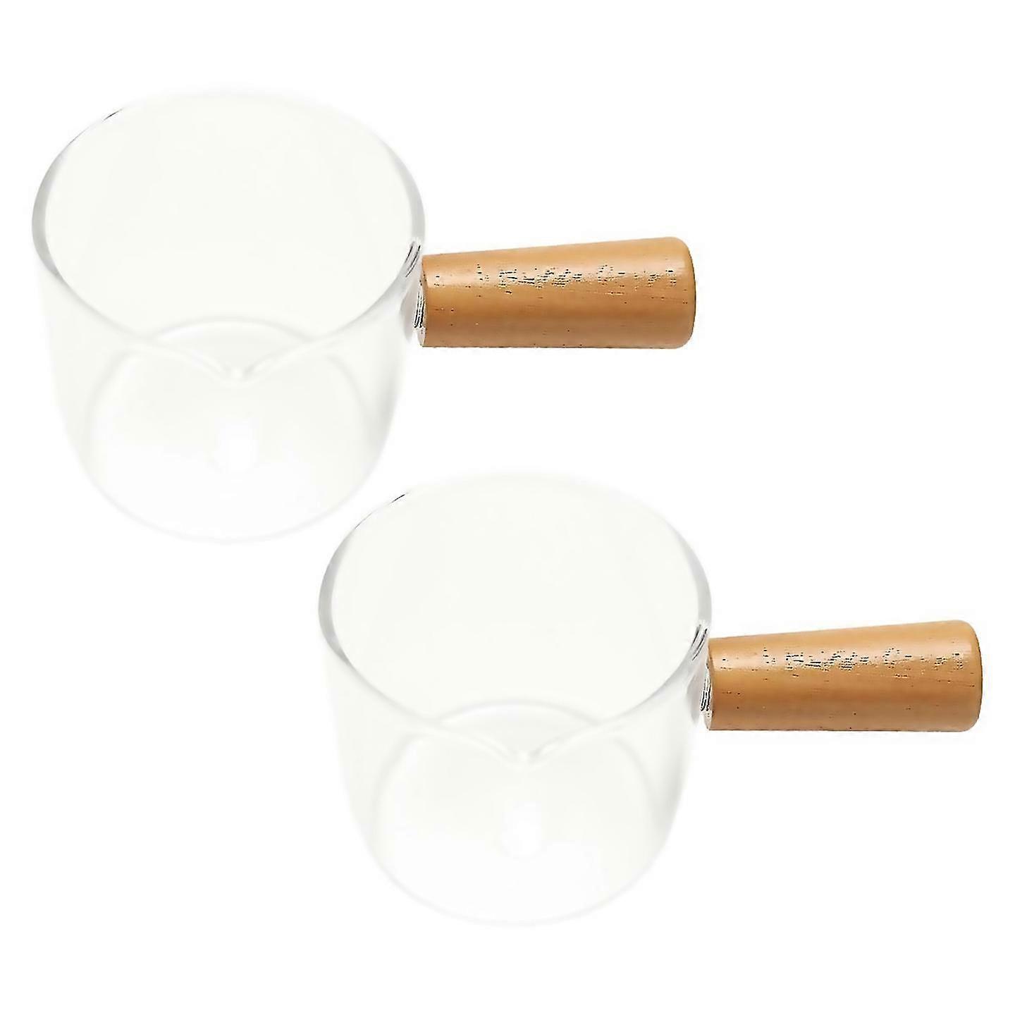 Til 2 stk gennemsigtigt glas med træhåndtag, flødekande. 100ml